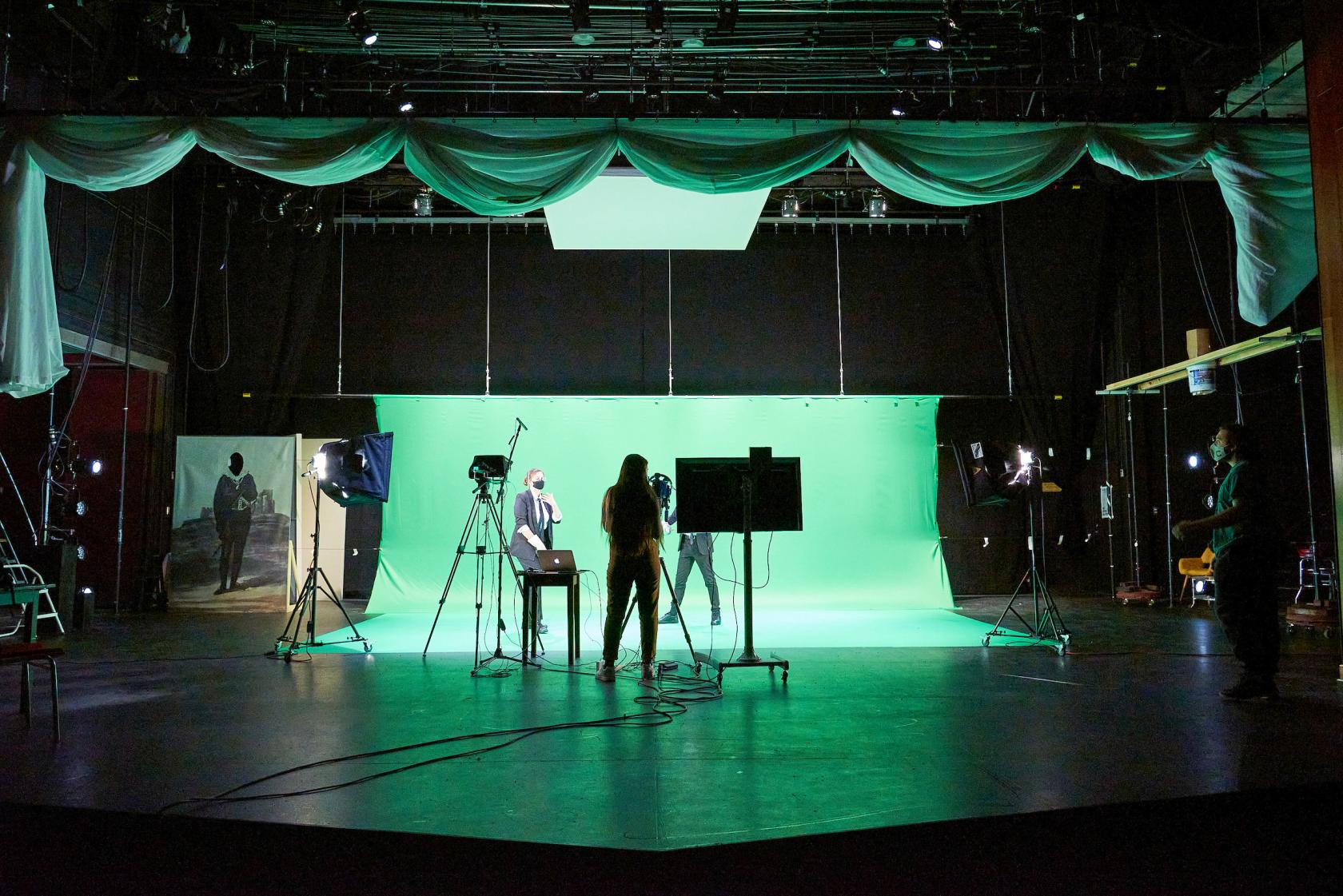 Students using a green screen as part of their production of Hamlet
